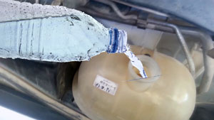 Accidentally Put Water in Coolant