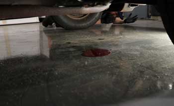 Read more about the article Red Fluid Leaking from Car